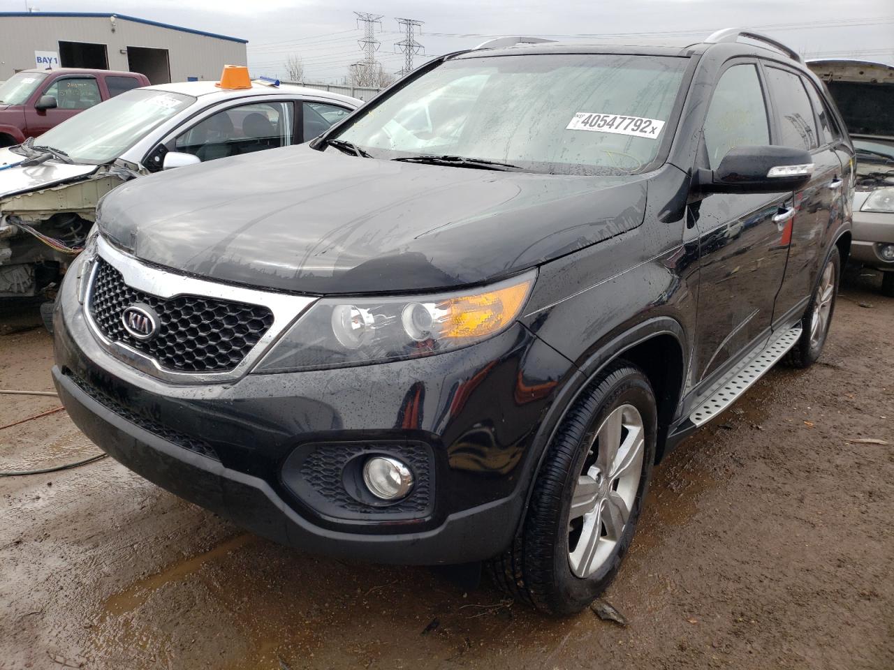 Photo 2 from auction – 2012 KIA SORENTO EX with VIN 5XYKU4A21CG243075