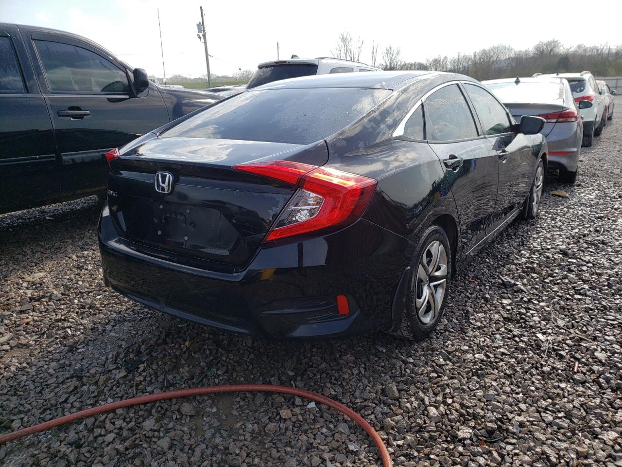 Photo 4 from auction – 2018 HONDA CIVIC LX with VIN 19XFC2F57JE011649