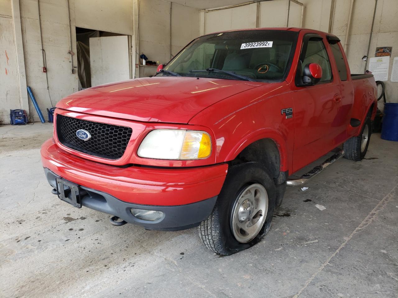 Photo 2 from auction – 1999 FORD F150 with VIN 1FTRX08W7XKB64002