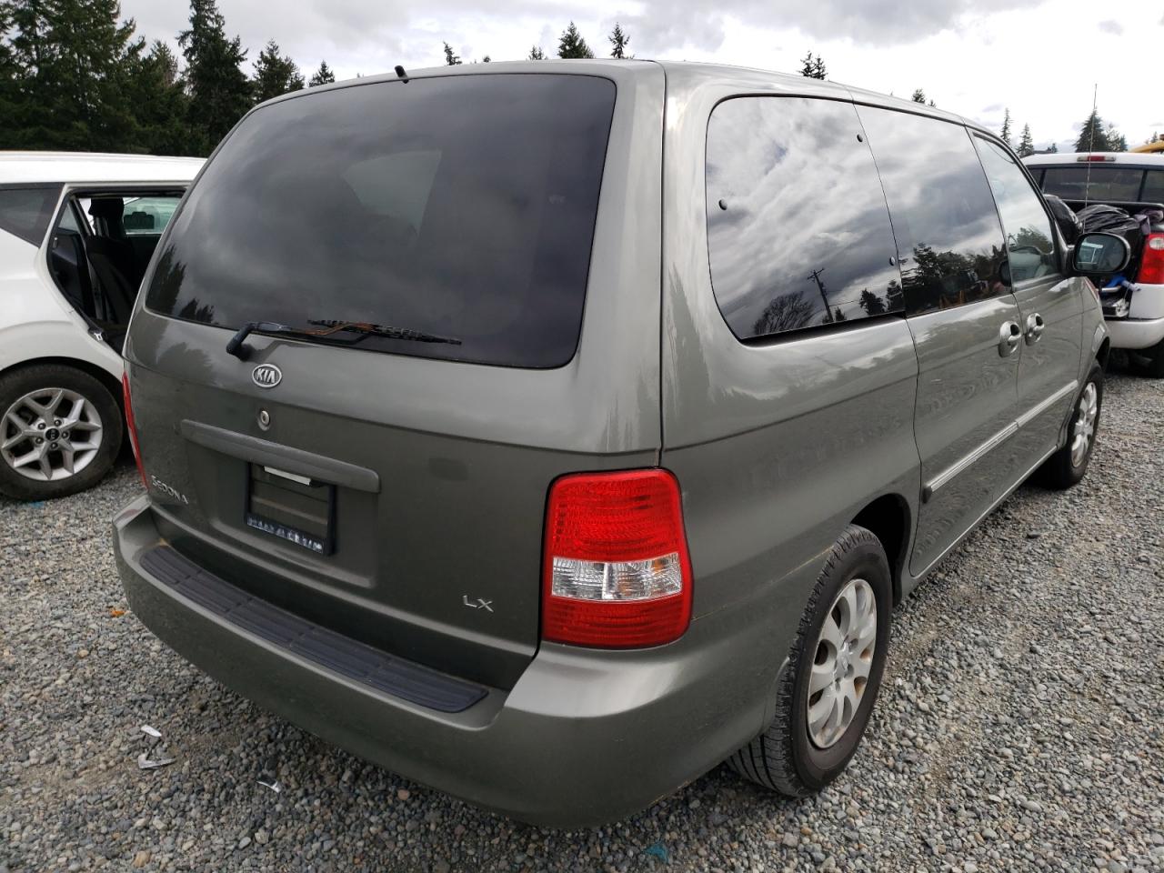 Photo 4 from auction – 2005 KIA SEDONA EX with VIN KNDUP132456675726