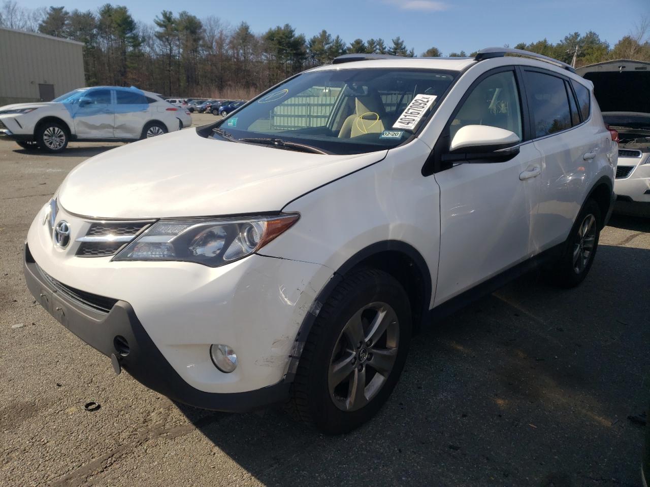 Photo 2 from auction – 2015 TOYOTA RAV4 XLE with VIN JTMRFREVXFD116547