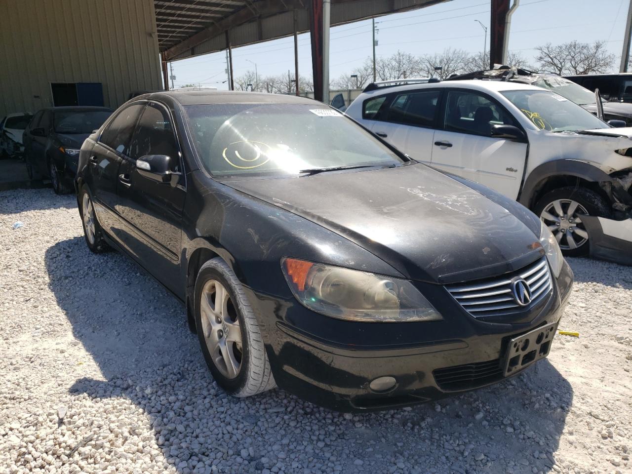 ACURA RL 2006 with VIN JH4KB16536C004223 - Photo from auction