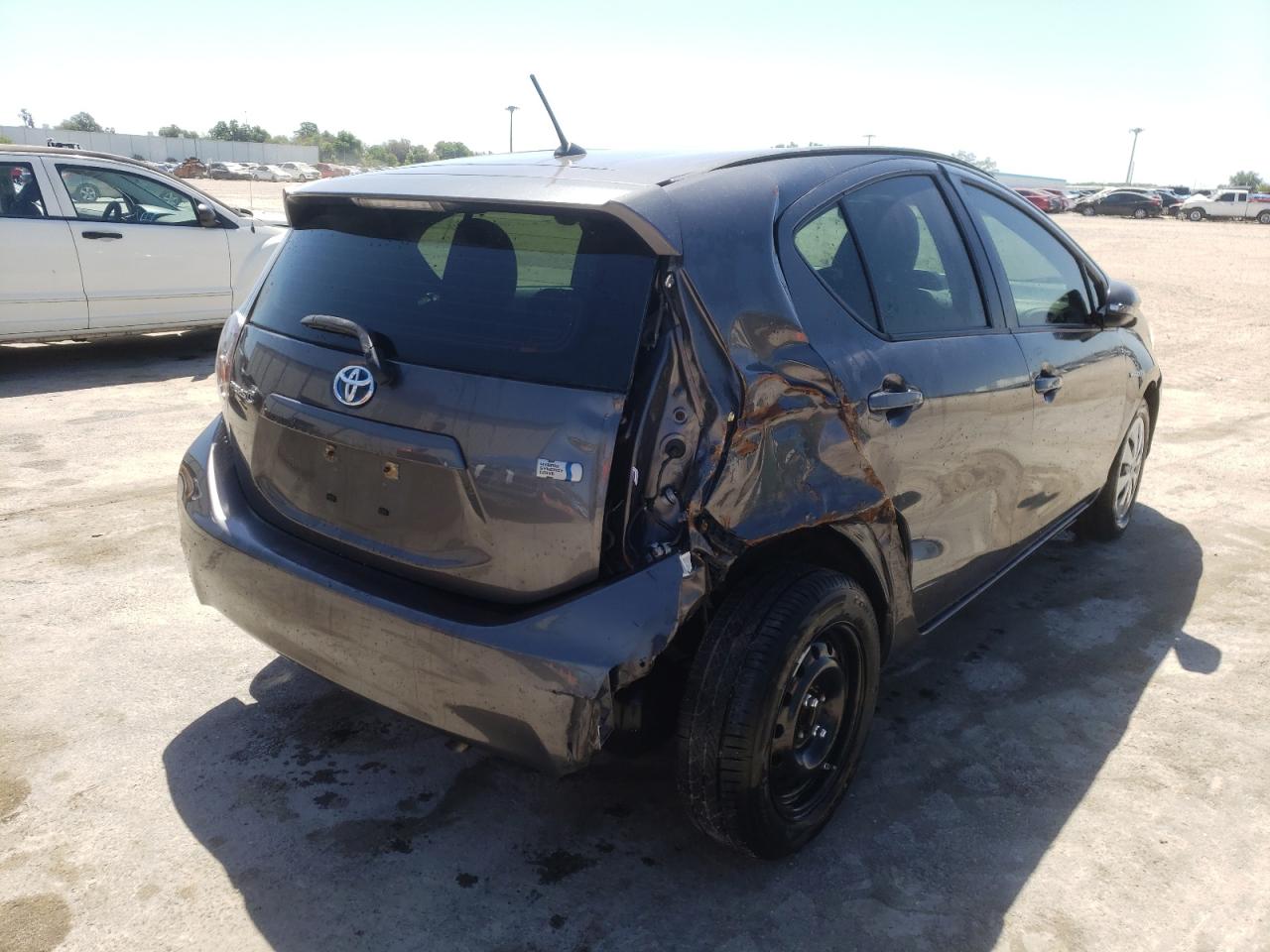 Photo 4 from auction – 2013 TOYOTA PRIUS C with VIN JTDKDTB32D1544151