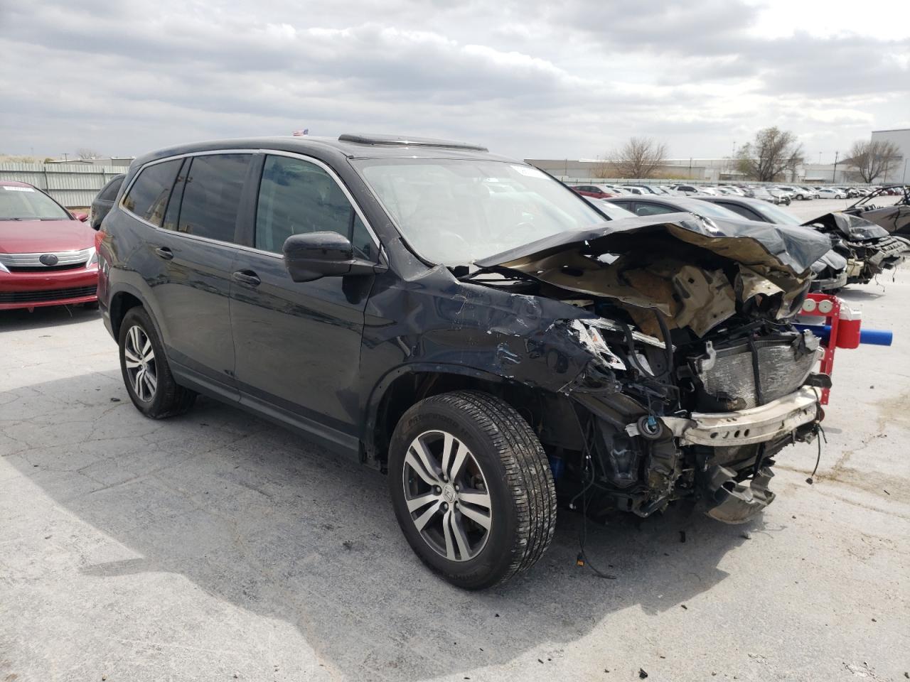 HONDA PILOT EXL 2016 with VIN 5FNYF6H53GB025281 - Photo from auction