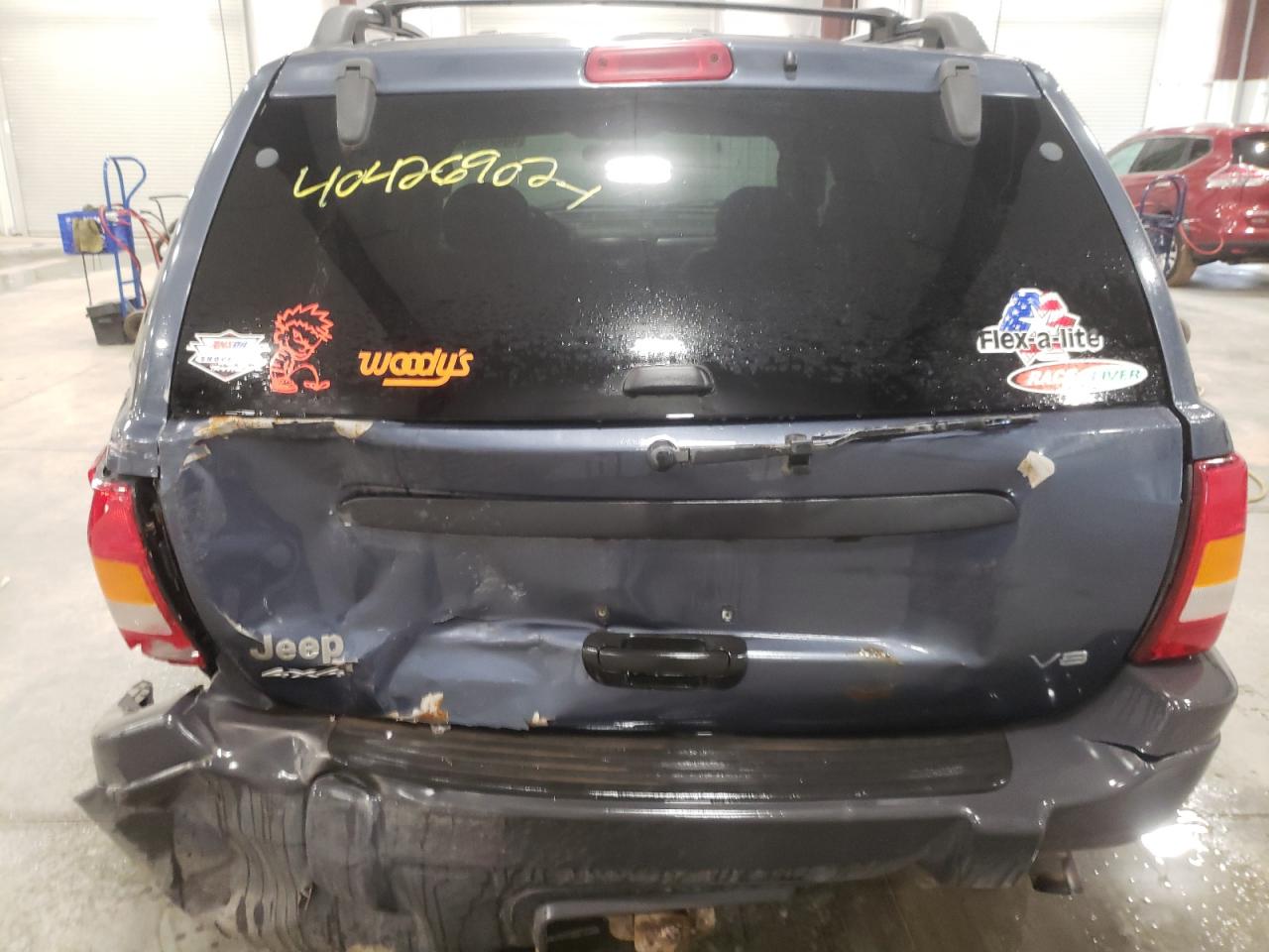 Photo 9 from auction – 2003 JEEP CHEROKEE with VIN 1J4GW48N13C524601