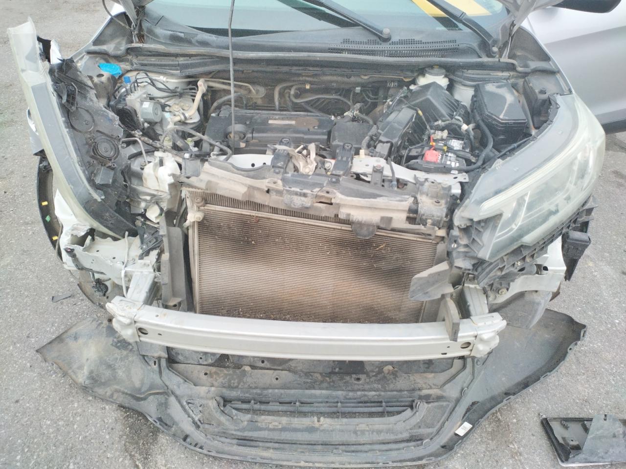 Photo 7 from auction – 2016 HONDA CR-V LX with VIN 2HKRM4H36GH660879