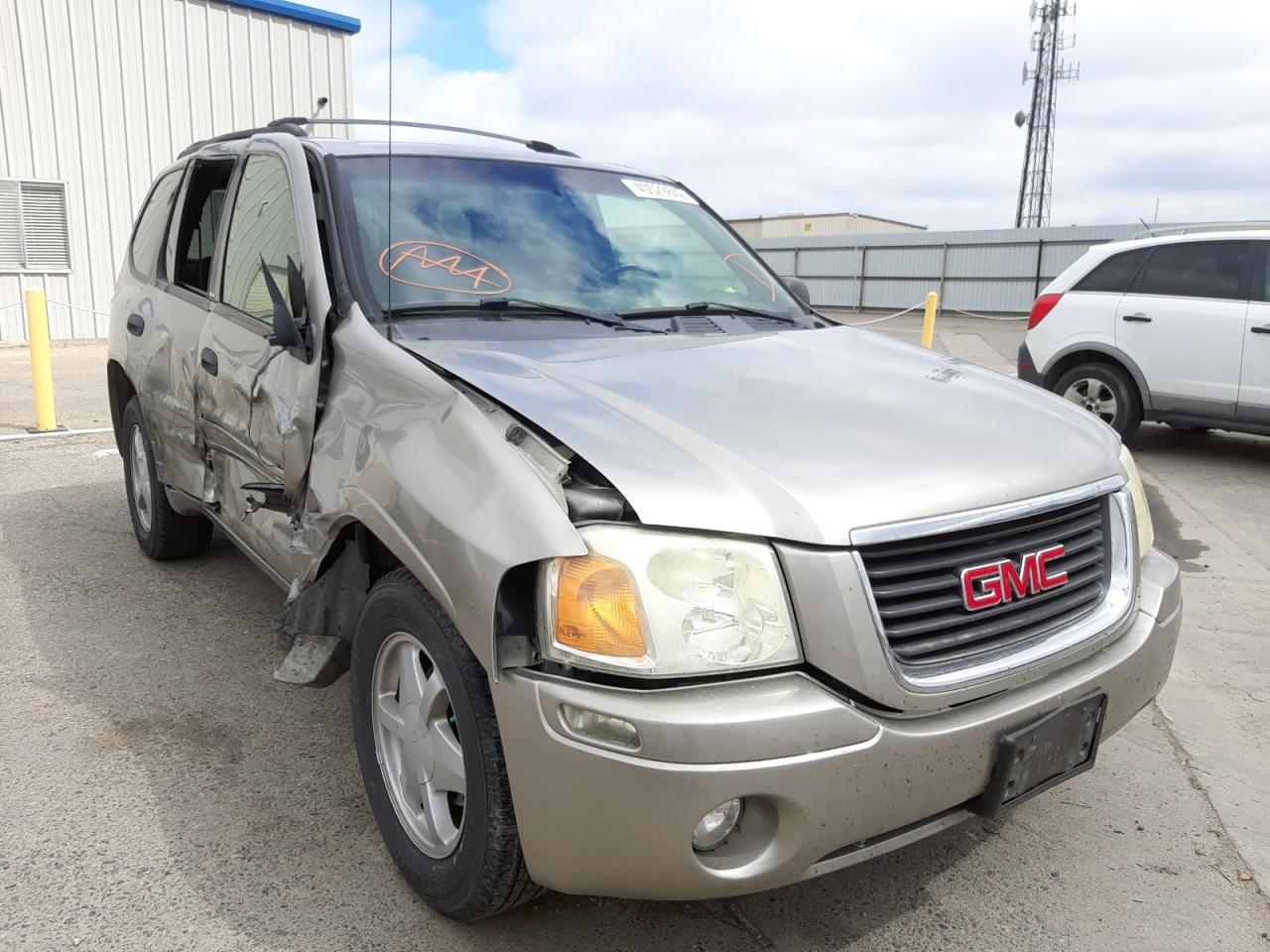 GMC ENVOY 2003 with VIN 1GKDS13S432164749 - Photo from auction