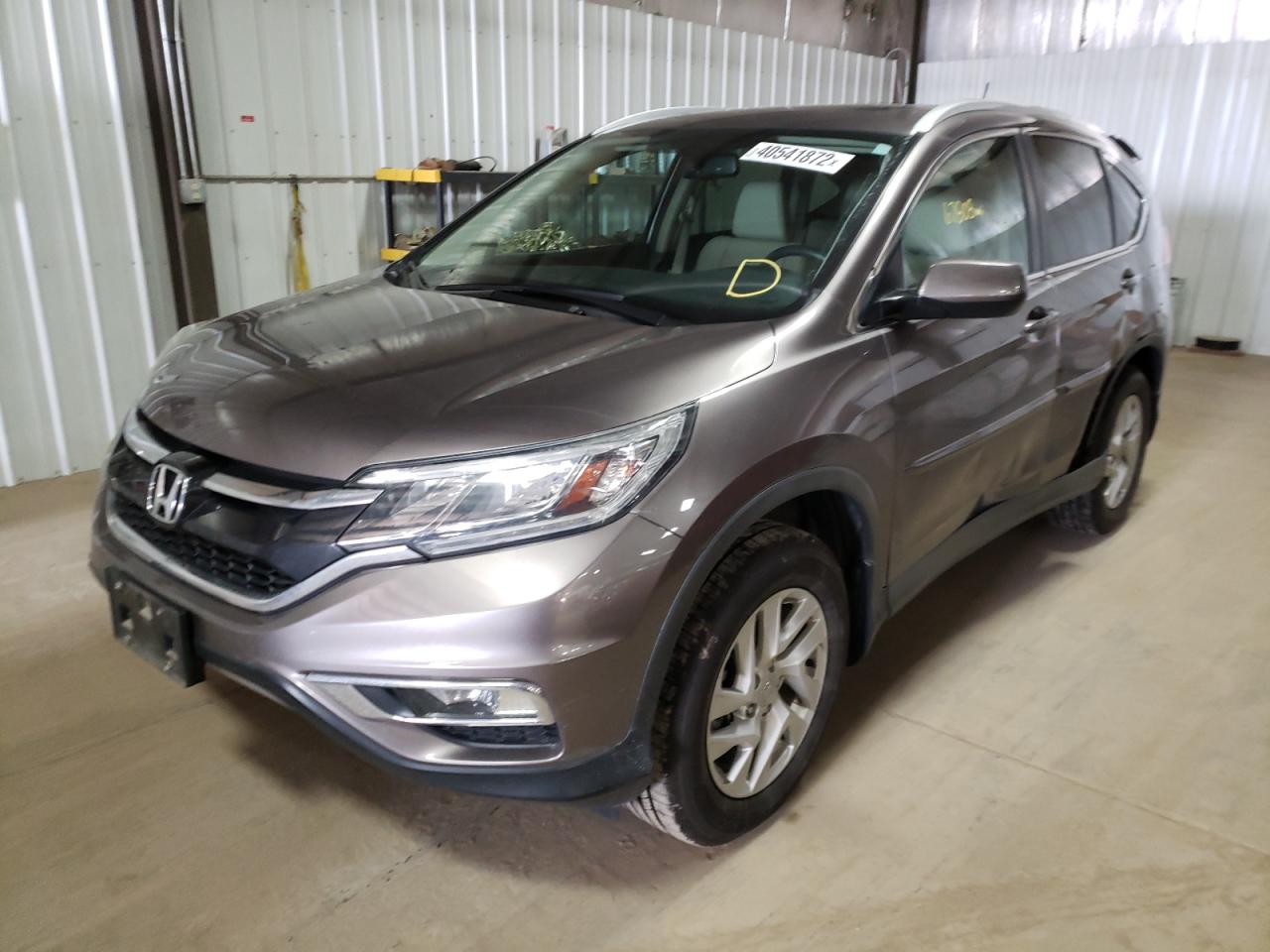 Photo 2 from auction – 2015 HONDA CR-V EXL with VIN 5J6RM4H77FL051971