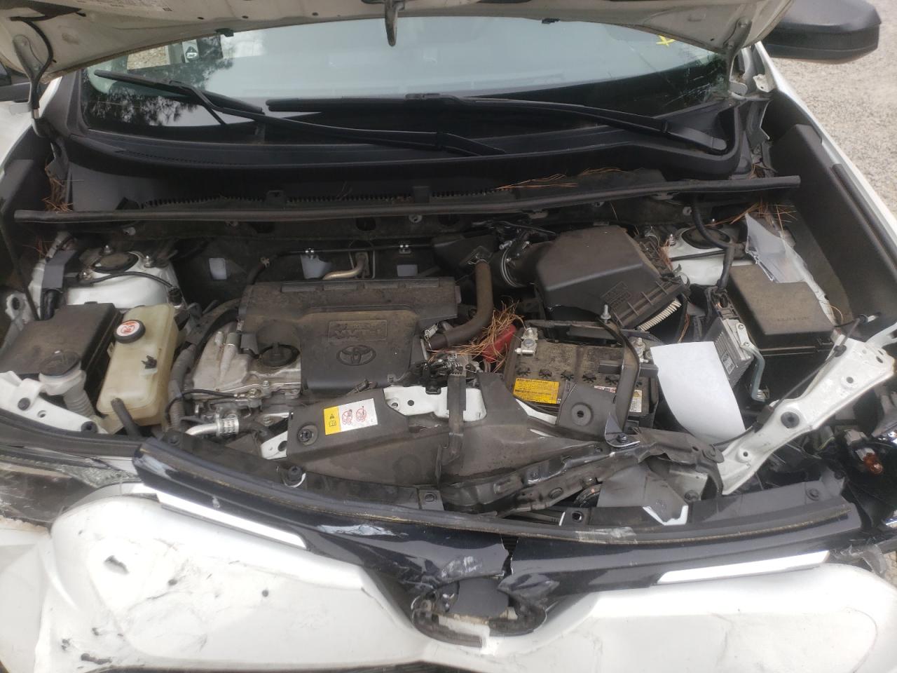 Photo 7 from auction – 2018 TOYOTA RAV4 LE with VIN JTMZFREV6JJ730781