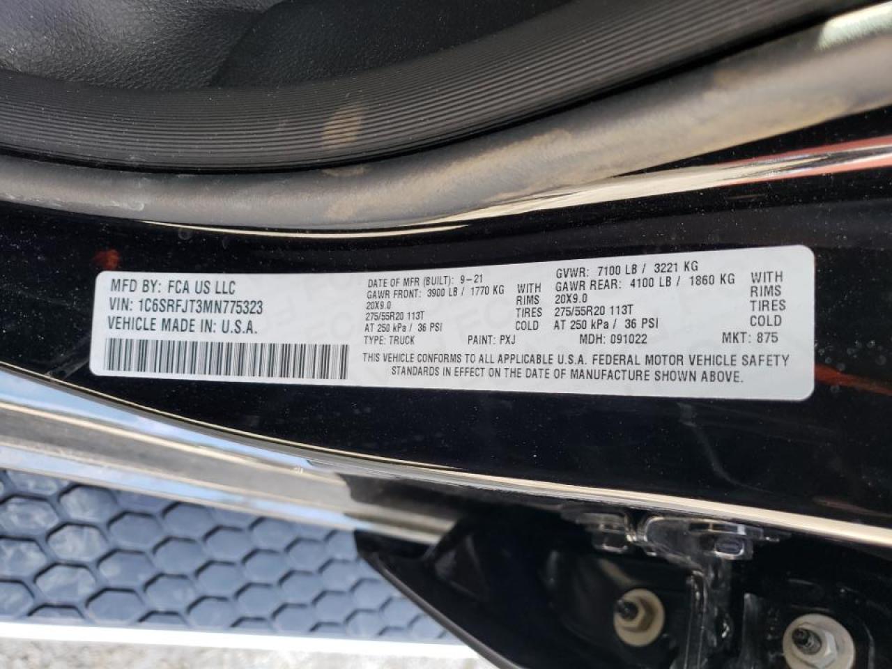 Photo 10 from auction – 2021 RAM 1500 LARAM with VIN 1C6SRFJT3MN775323