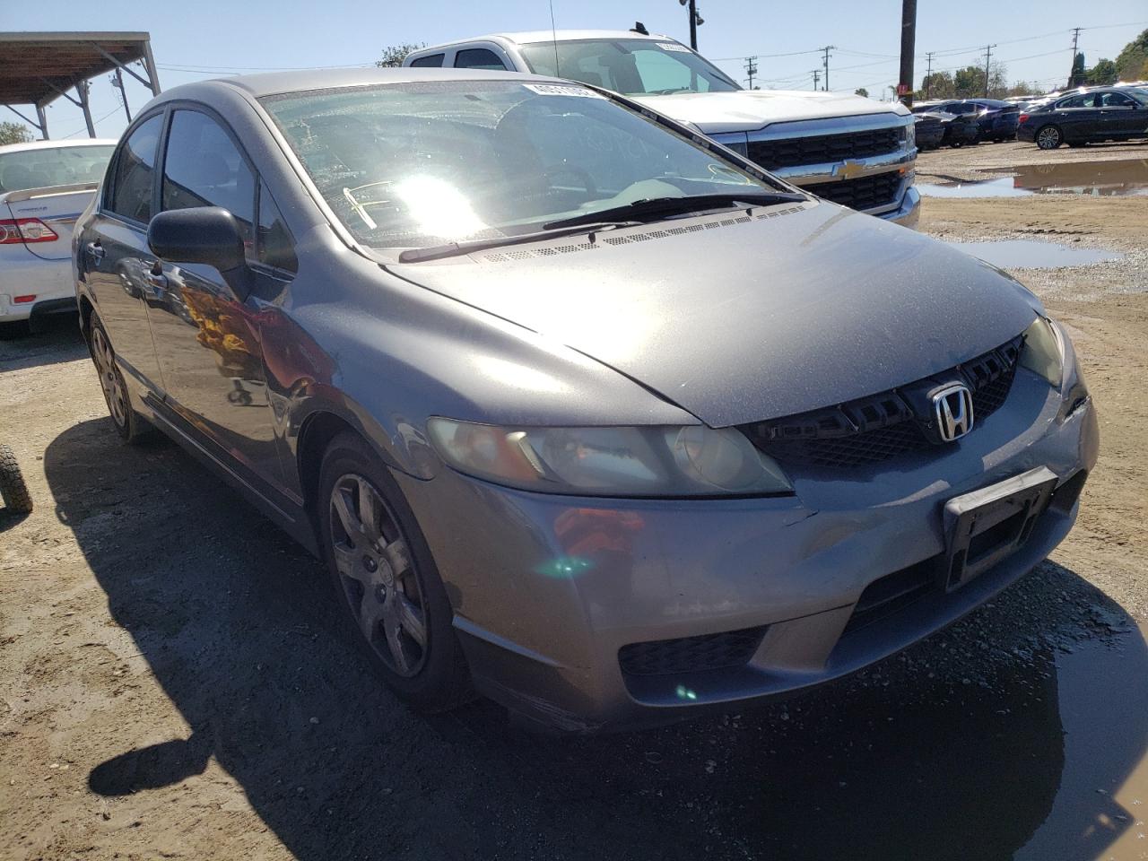 HONDA CIVIC LX 2010 with VIN 19XFA1F5XAE038490 - Photo from auction