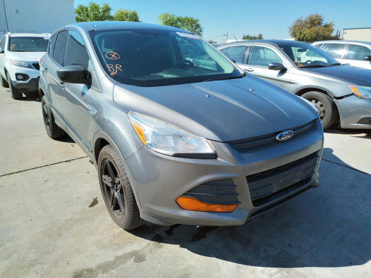 FORD ESCAPE S 2014 with VIN 1FMCU0F74EUD51415 - Photo from auction