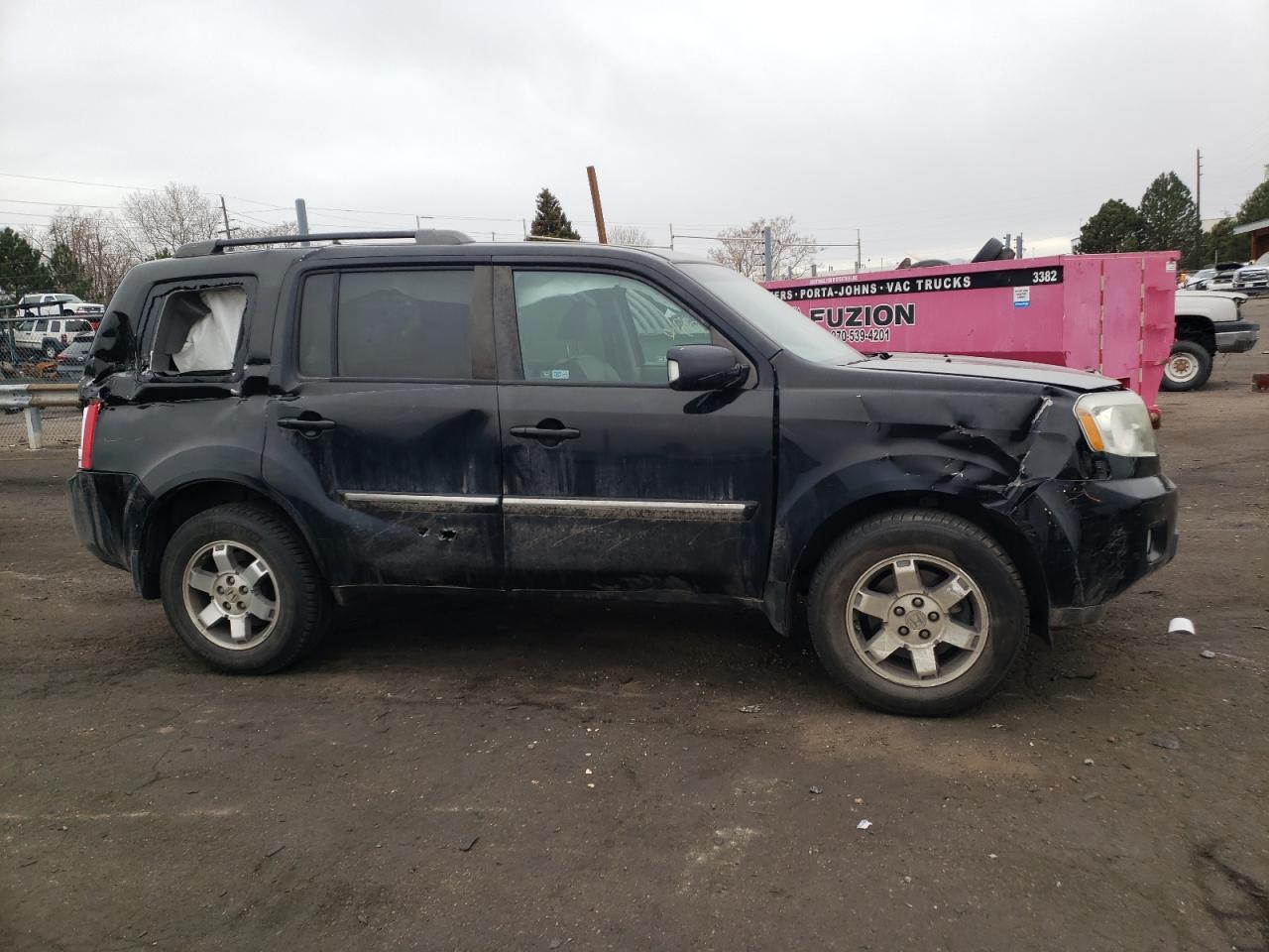 Photo 9 from auction – 2011 HONDA PILOT TOUR with VIN 5FNYF4H92BB080952
