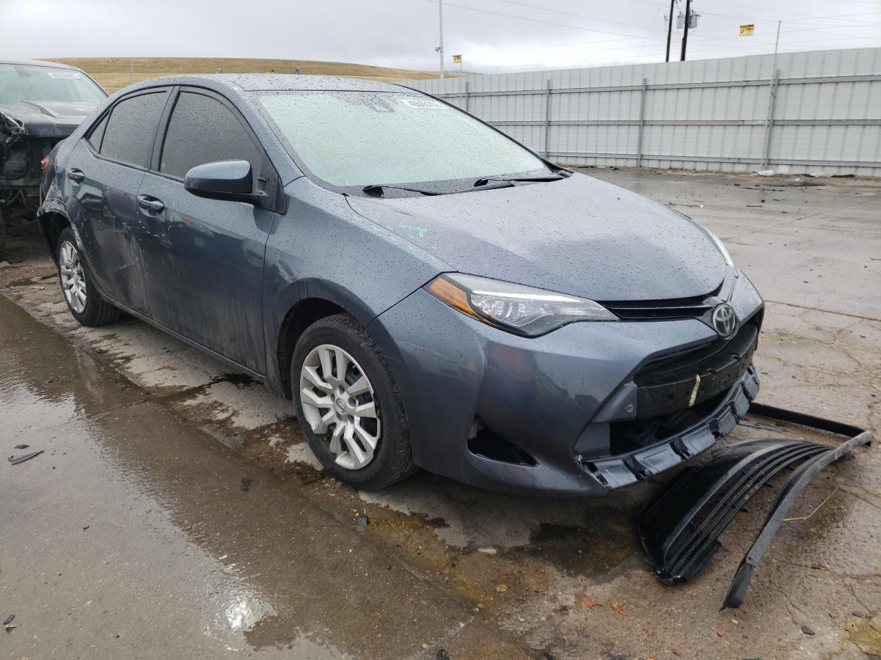TOYOTA COROLLA L 2017 with VIN 5YFBURHE0HP579476 - Photo from auction