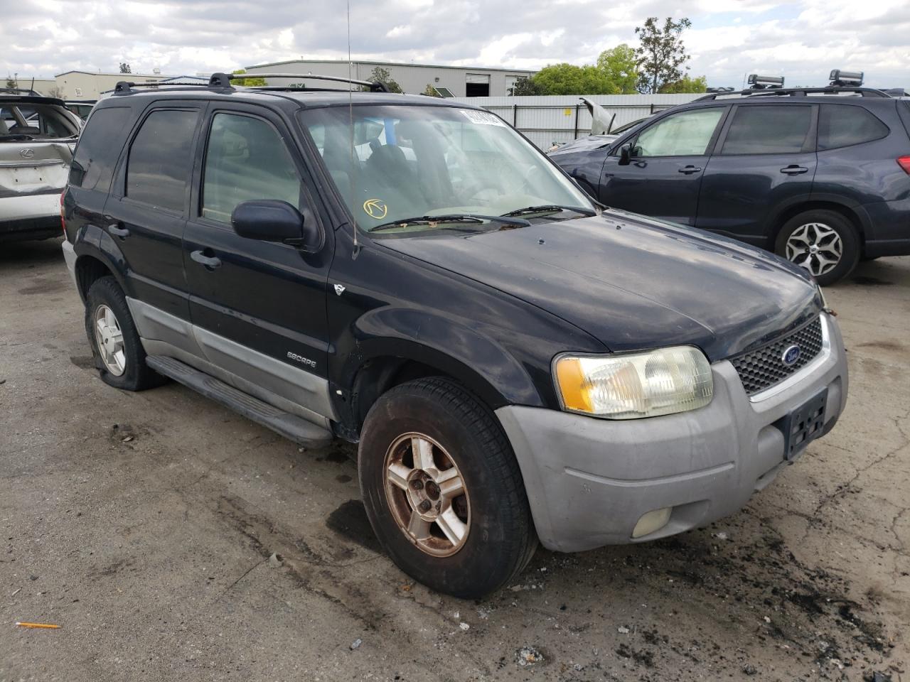 FORD ESCAPE 2001 with VIN 1FMCU031X1KC22648 - Photo from auction