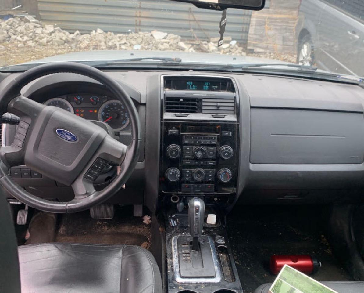 Photo 9 from auction – 2010 FORD ESCAPE LIM with VIN 1FMCU9EG8AKA68611