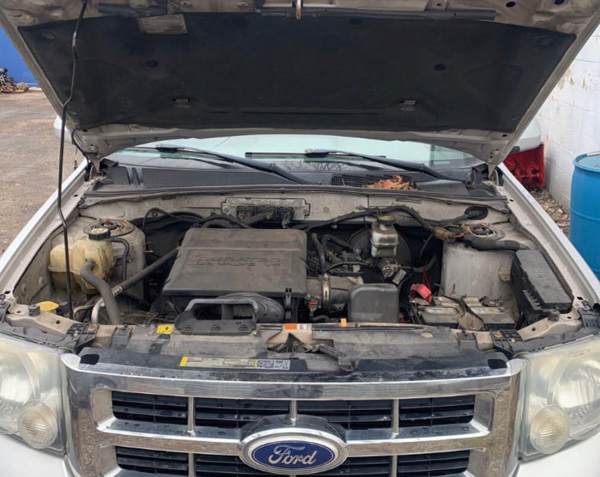 Photo 7 from auction – 2010 FORD ESCAPE LIM with VIN 1FMCU9EG8AKA68611