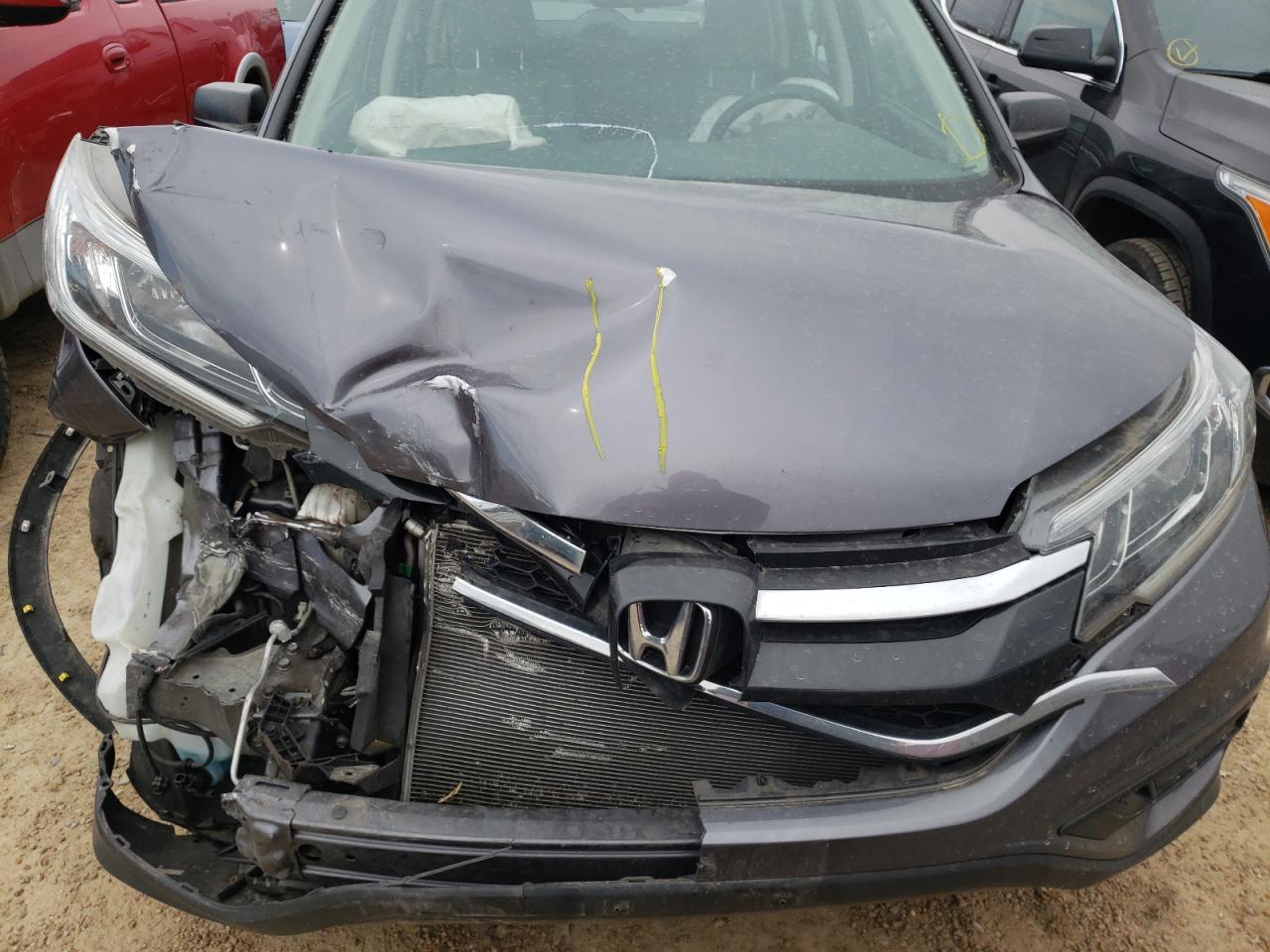Photo 7 from auction – 2016 HONDA CR-V LX with VIN 5J6RM4H31GL135914