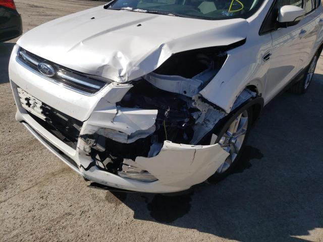 Photo 9 from auction – 2014 FORD ESCAPE TIT with VIN 1FMCU9J97EUD15215