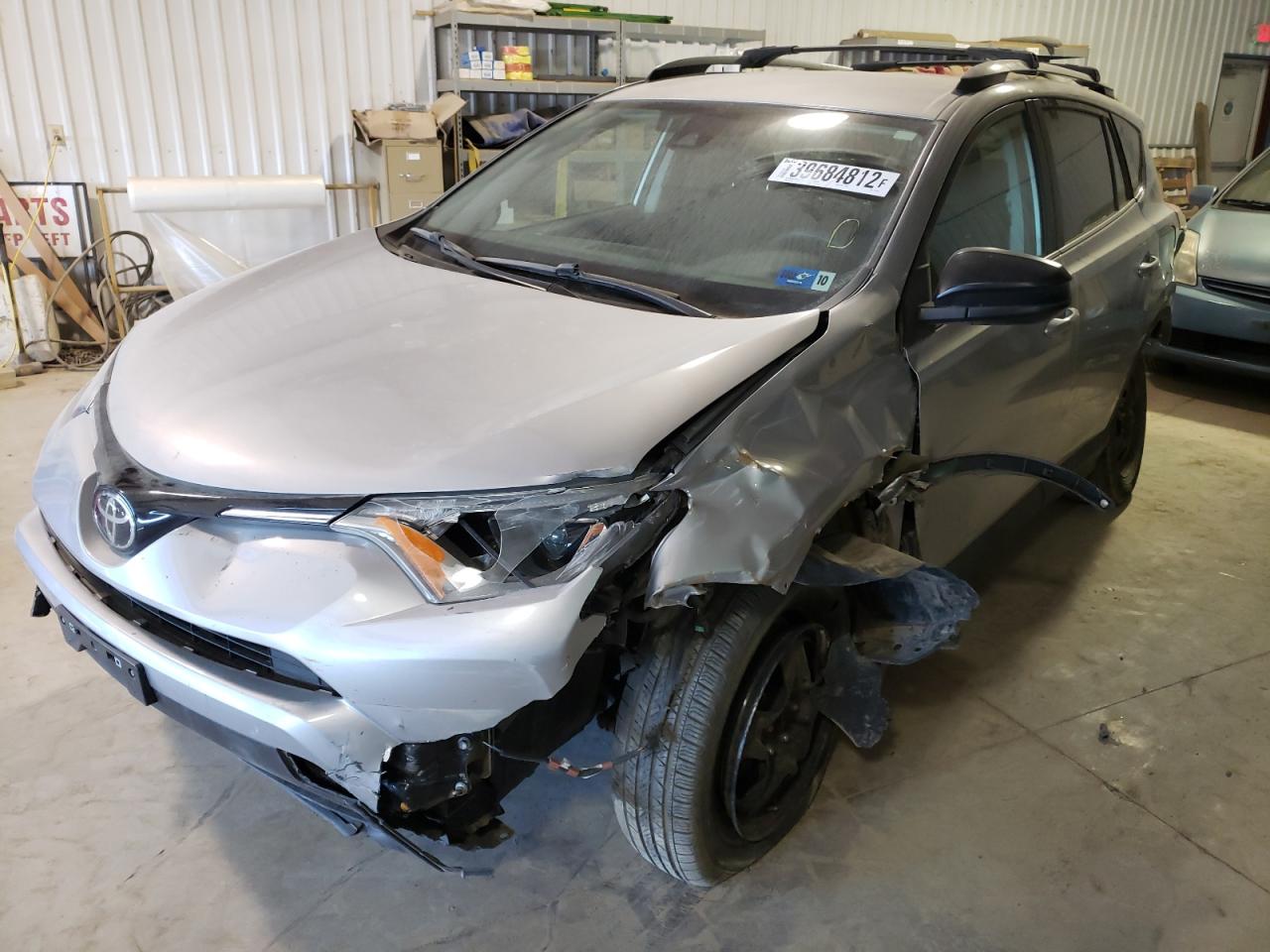 Photo 2 from auction – 2017 TOYOTA RAV4 LE with VIN 2T3BFREV3HW597698