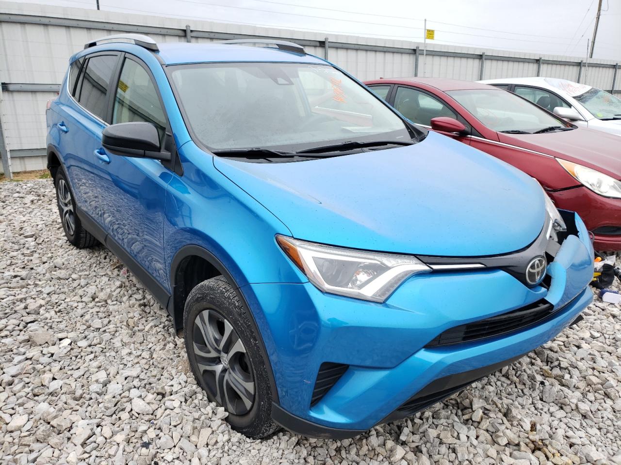 TOYOTA RAV4 LE 2018 with VIN JTMZFREV1JD131964 - Photo from auction