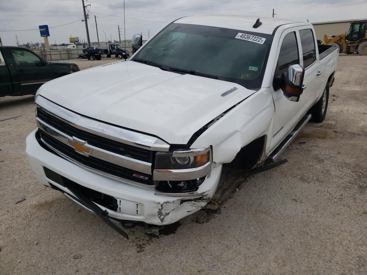 Photo 2 from auction – 2015 CHEVROLET SILVERADO with VIN 1GC1KWE84FF657809