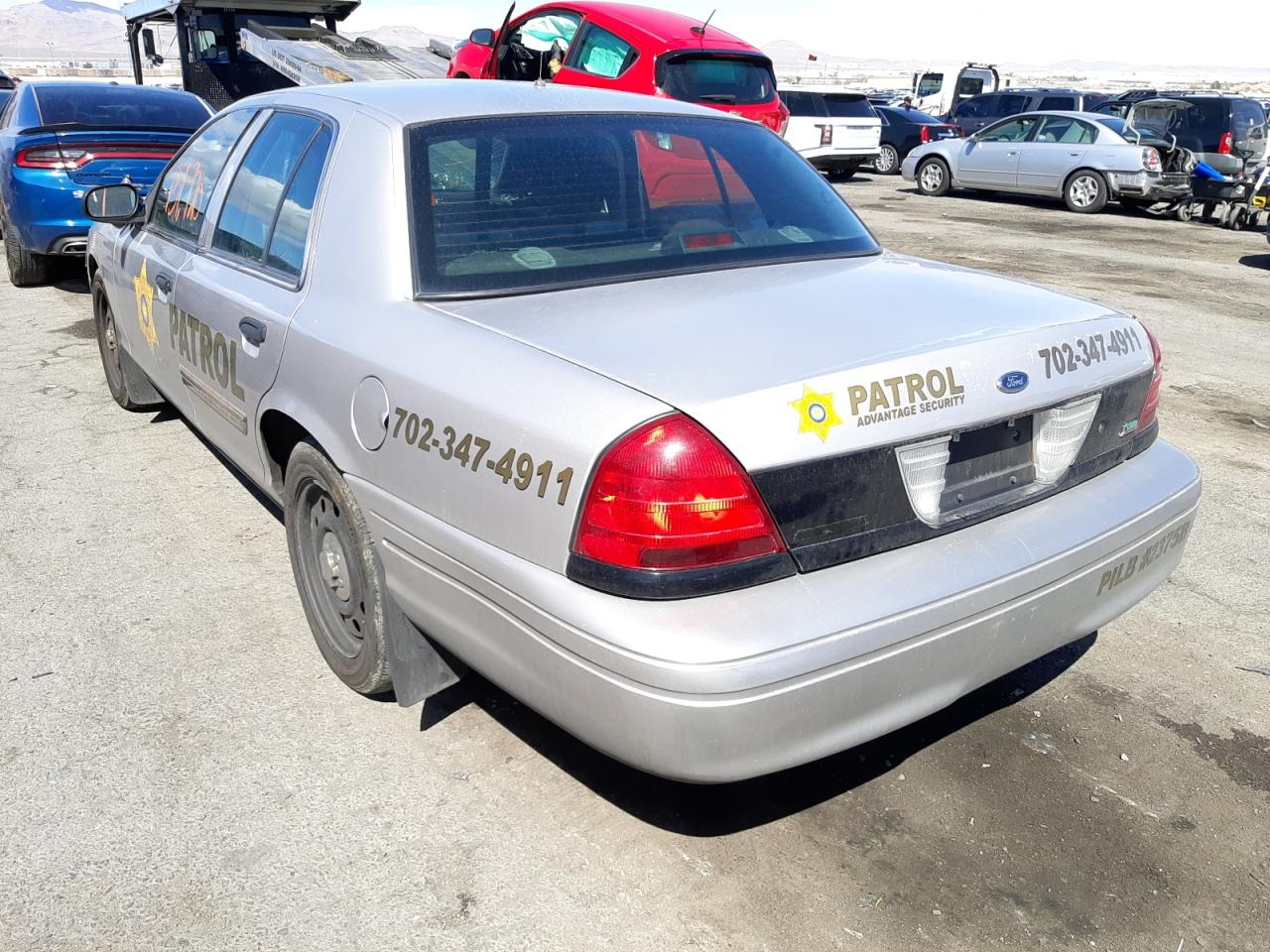 Photo 3 from auction – 2011 FORD CROWN VICT with VIN 2FABP7BV2BX182753