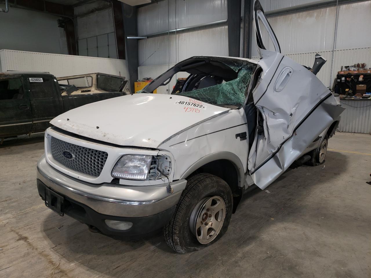 Photo 2 from auction – 1999 FORD F150 with VIN 1FTRX08W4XKB84398