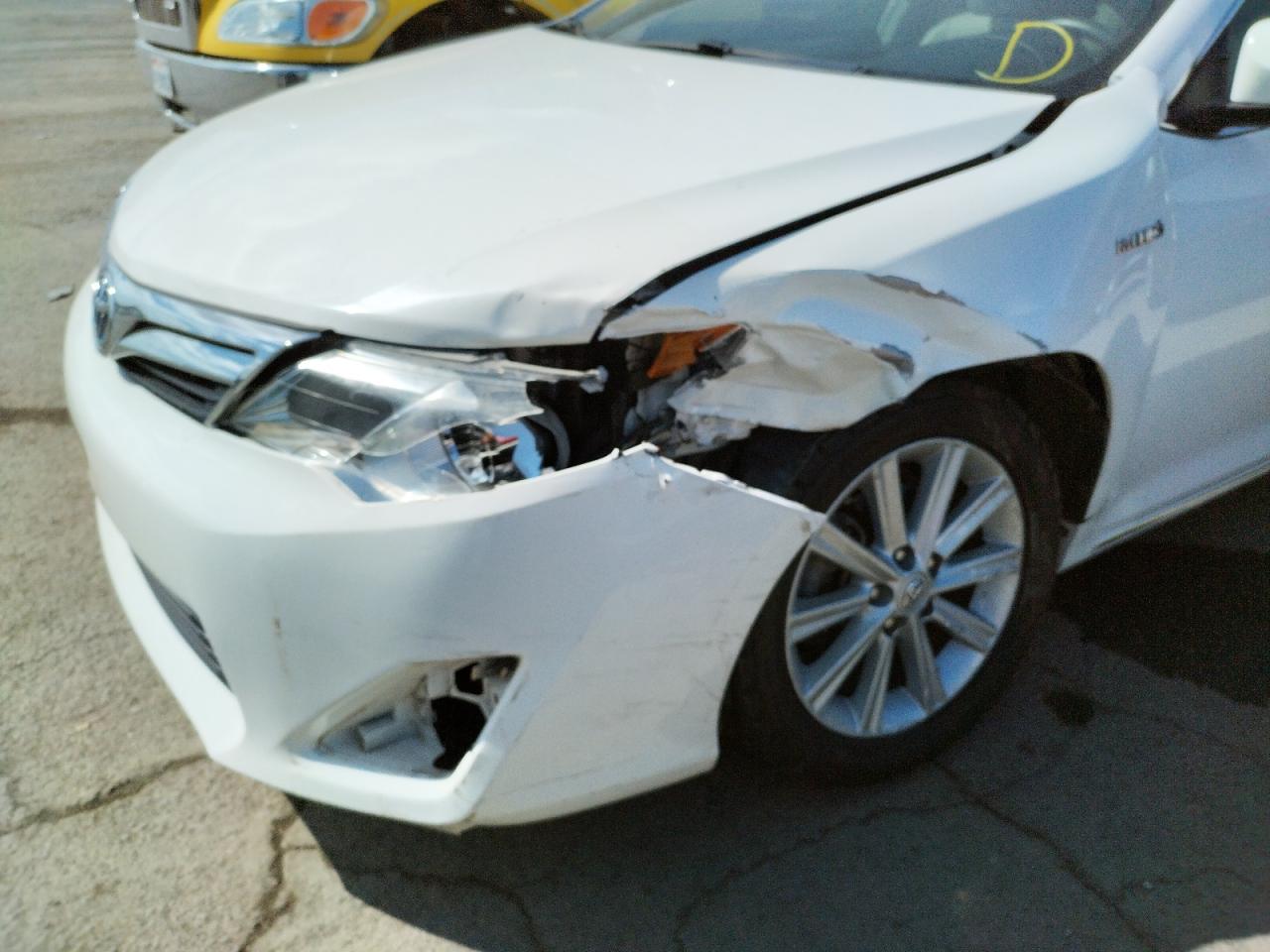 Photo 9 from auction – 2012 TOYOTA CAMRY HYBR with VIN 4T1BD1FK7CU026017