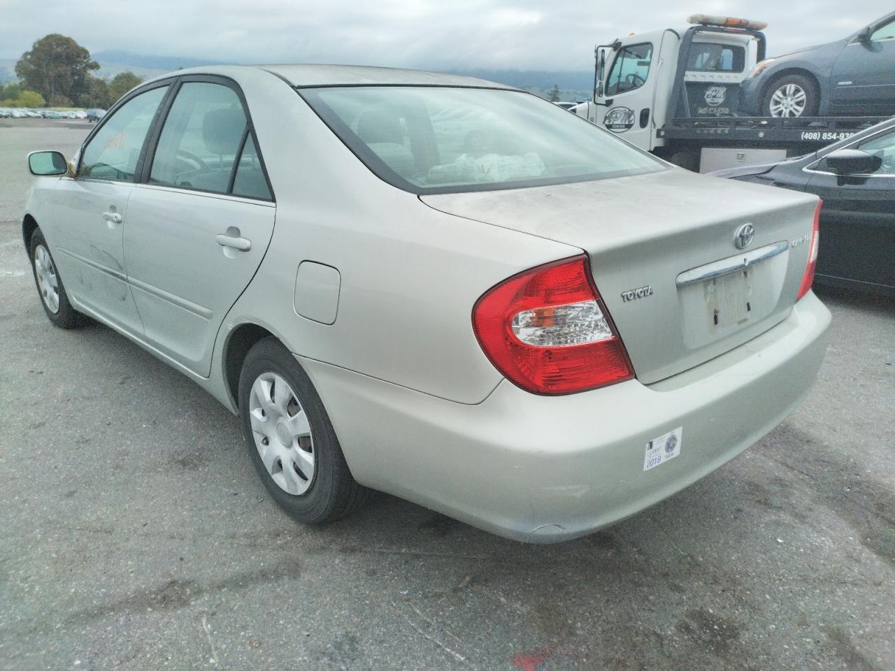 Photo 3 from auction – 2004 TOYOTA CAMRY LE with VIN JTDBE32K440251099