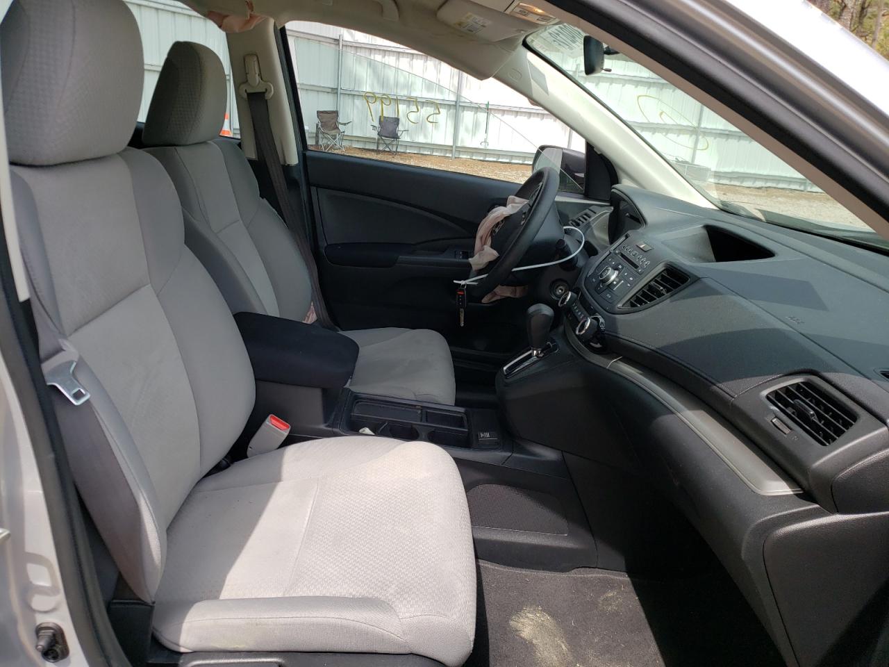 Photo 5 from auction – 2016 HONDA CR-V LX with VIN 2HKRM3H34GH560581