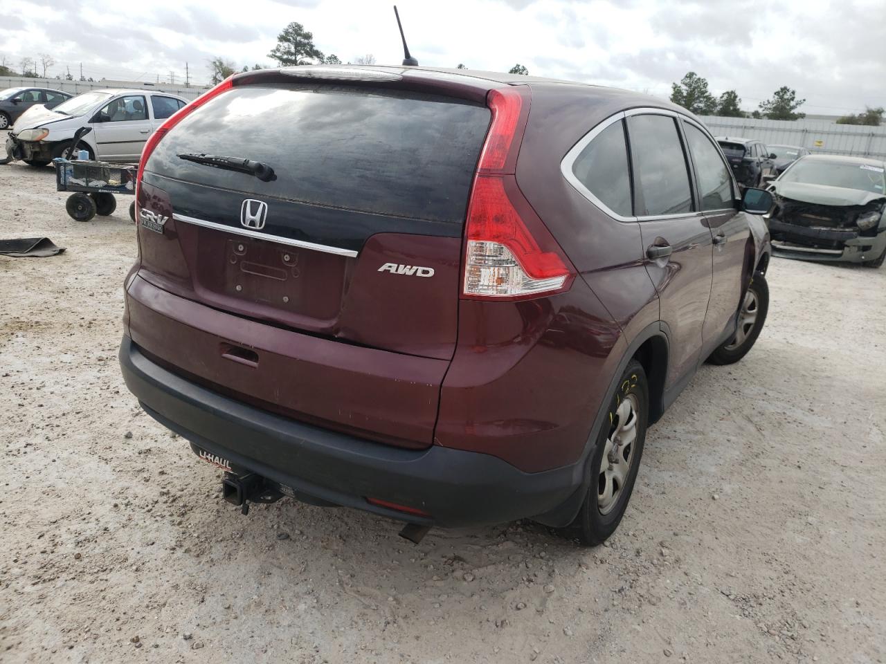 Photo 4 from auction – 2012 HONDA CR-V LX with VIN 5J6RM4H32CL033094