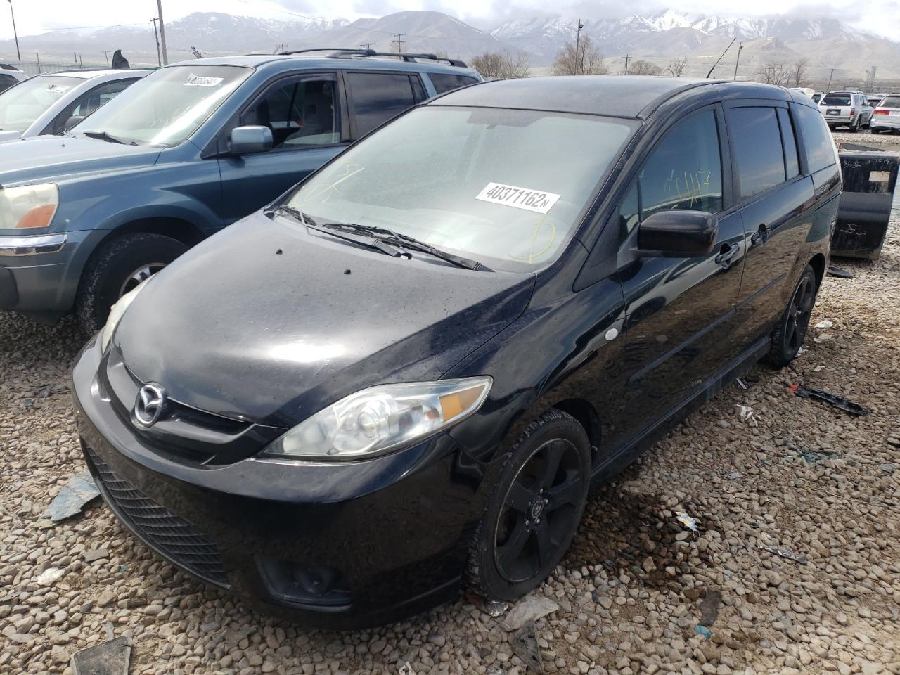 Photo 2 from auction – 2006 MAZDA 5 with VIN JM1CR293160115923