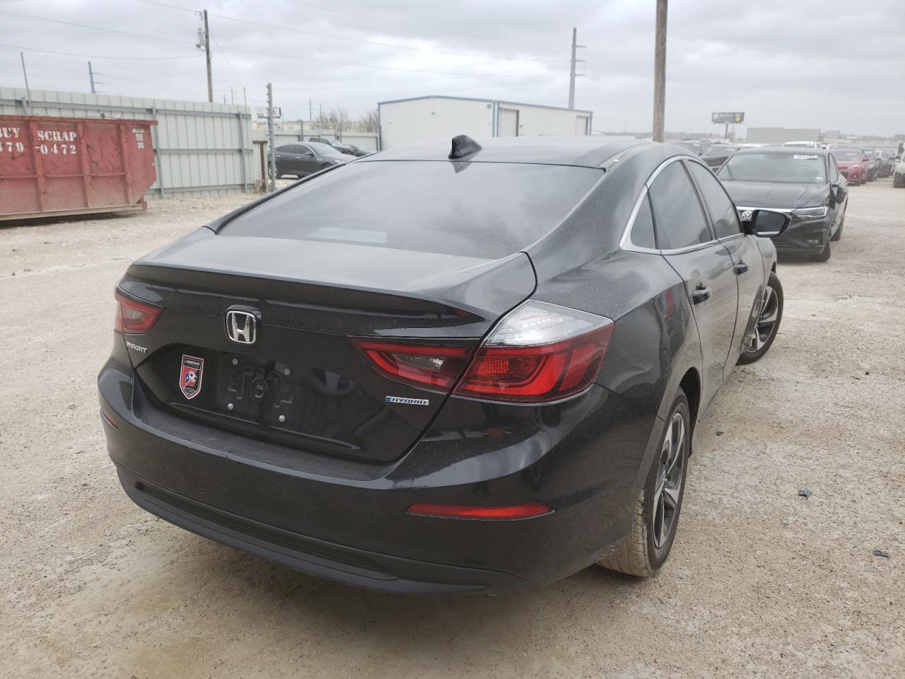 Photo 4 from auction – 2022 HONDA INSIGHT EX with VIN 19XZE4F52NE003953
