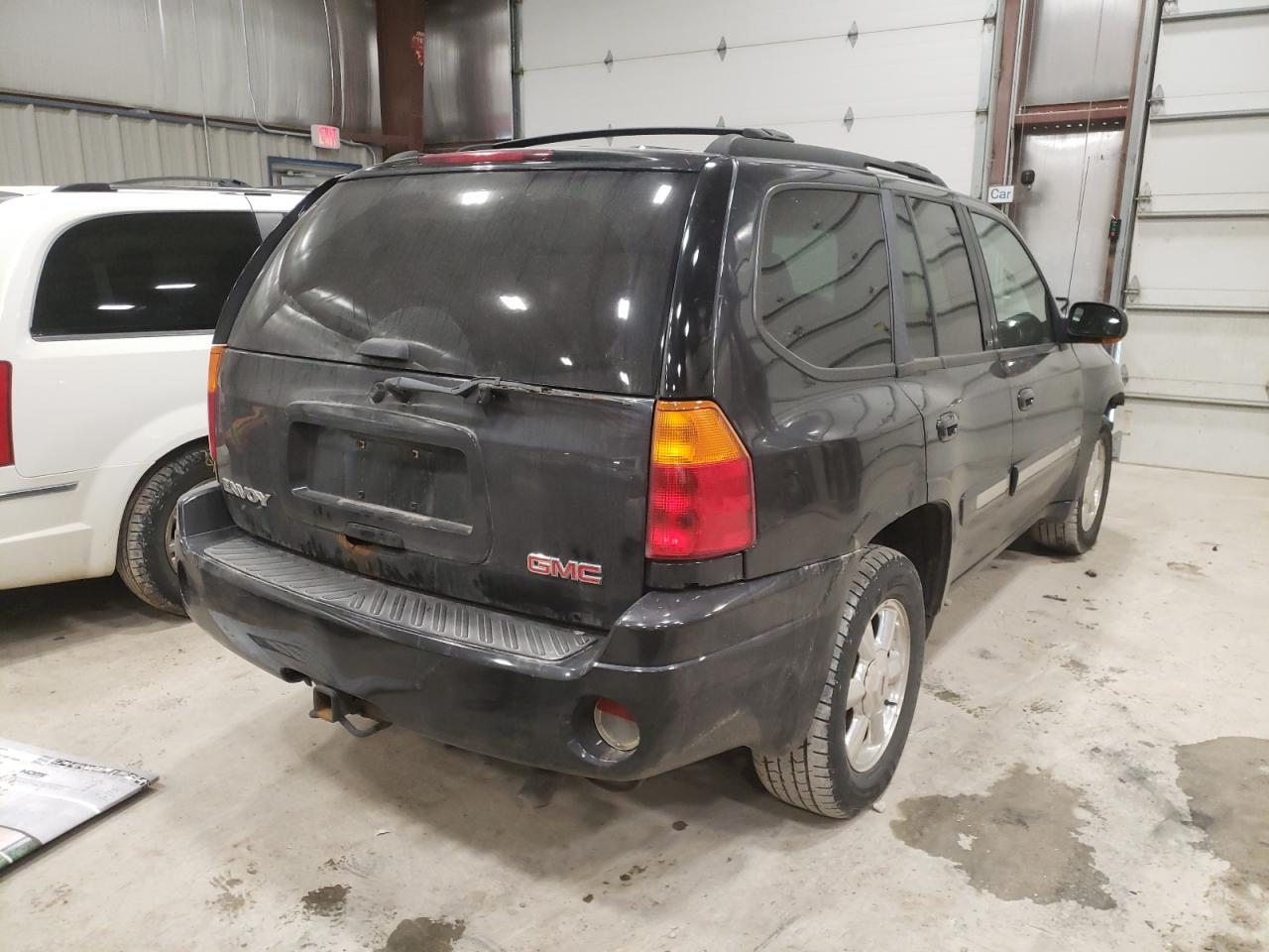 Photo 4 from auction – 2004 GMC ENVOY with VIN 1GKDT13S542393519