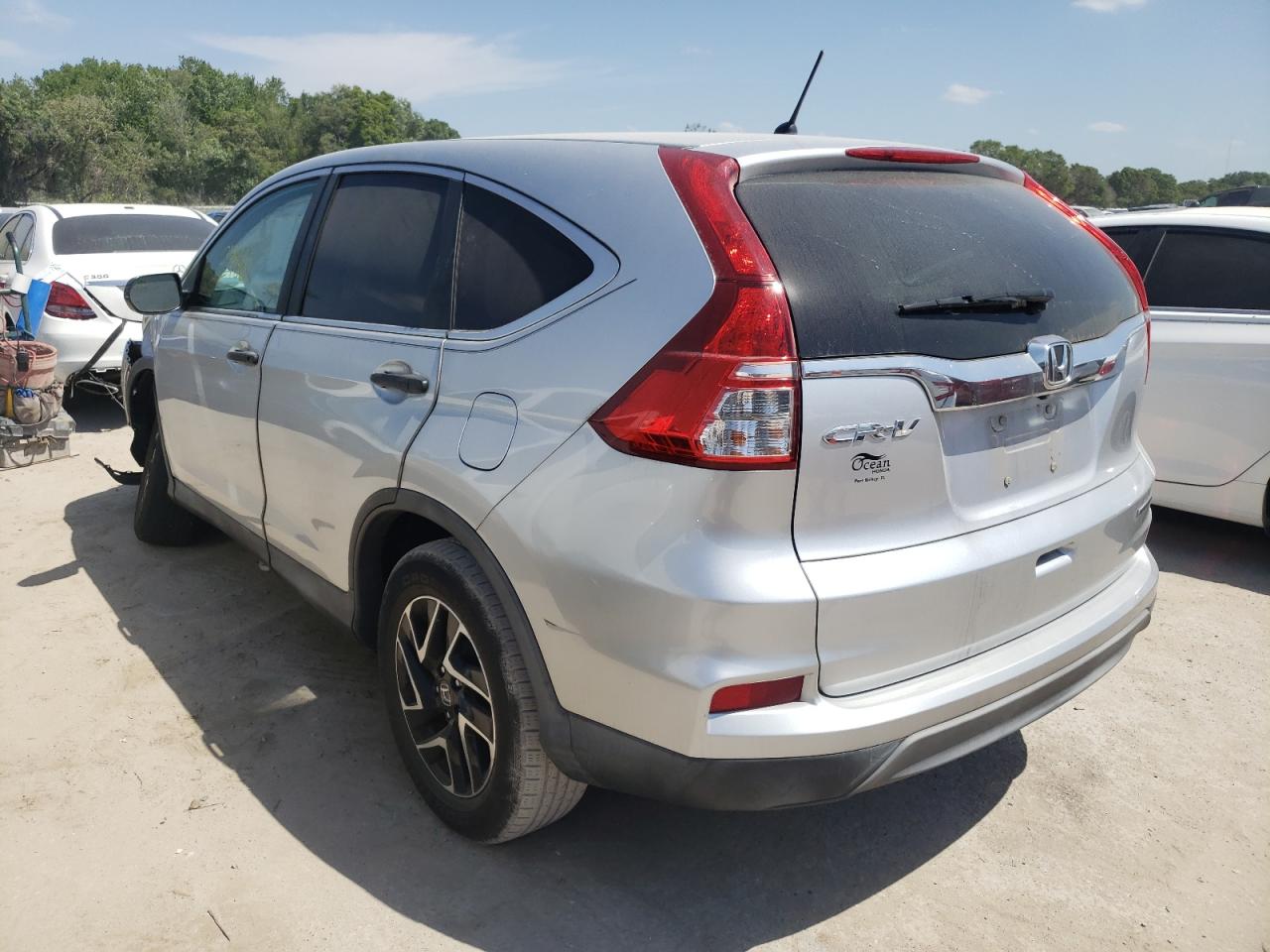 Photo 3 from auction – 2016 HONDA CR-V SE with VIN 2HKRM3H45GH513942