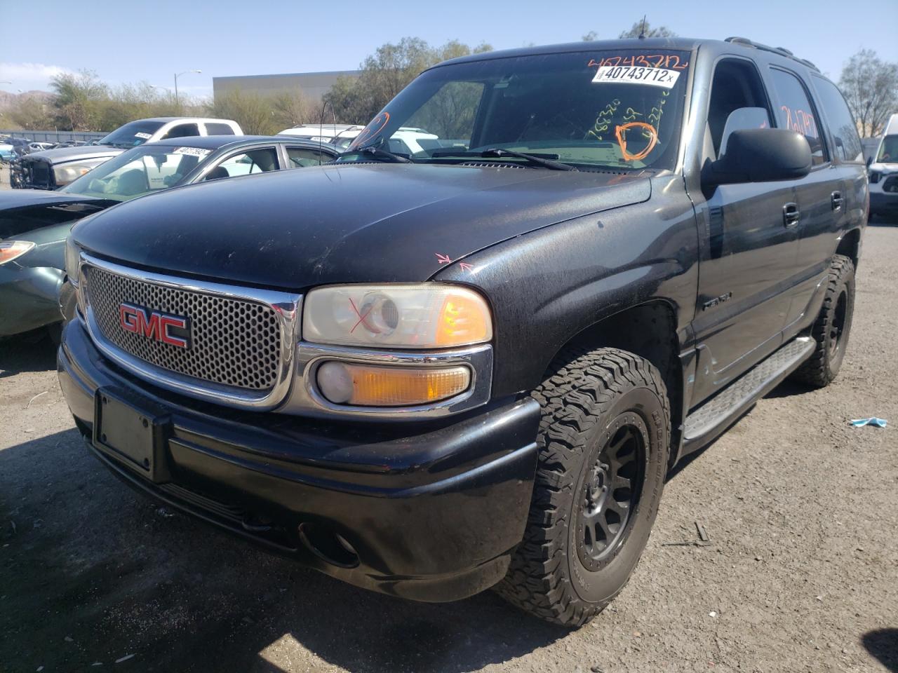 Photo 2 from auction – 2002 GMC DENALI with VIN 1GKEK63U42J222298