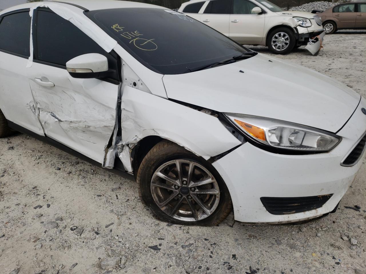 Photo 9 from auction – 2016 FORD FOCUS SE with VIN 1FADP3F26GL201360