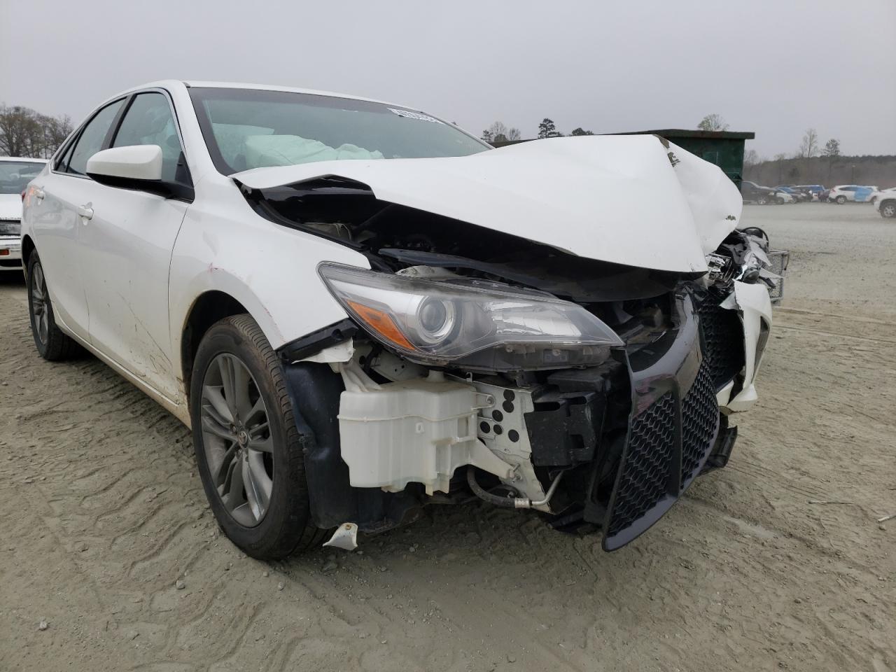 TOYOTA CAMRY LE 2017 with VIN 4T1BF1FKXHU422489 - Photo from auction