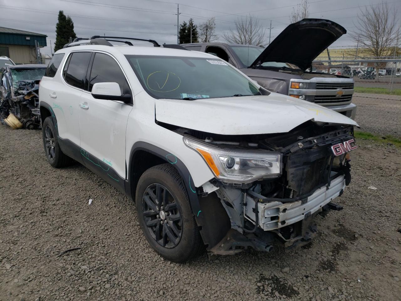 GMC ACADIA SLT 2018 with VIN 1GKKNULS2JZ174751 - Photo from auction