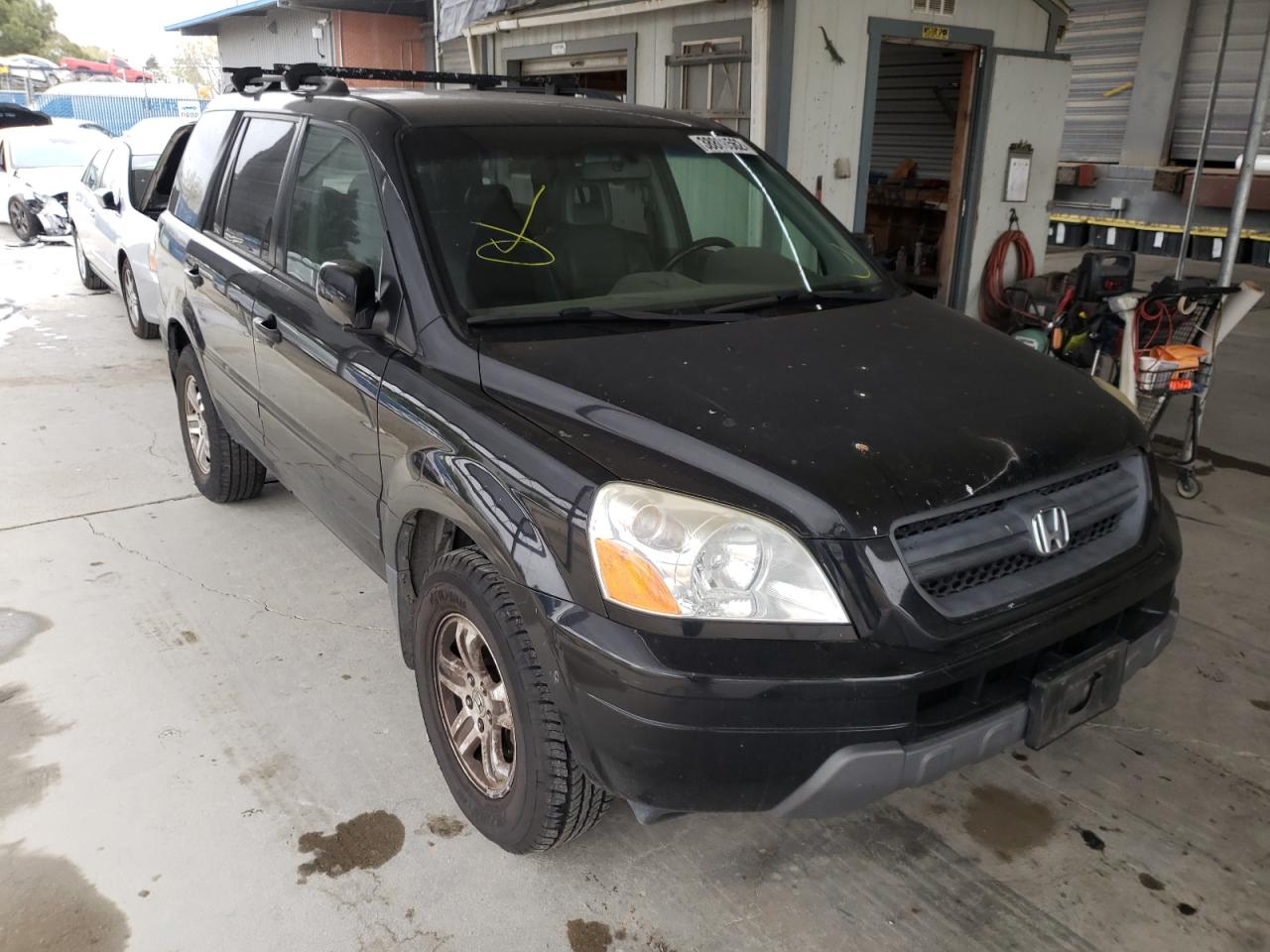 HONDA PILOT EXL 2003 with VIN 2HKYF18653H573354 - Photo from auction