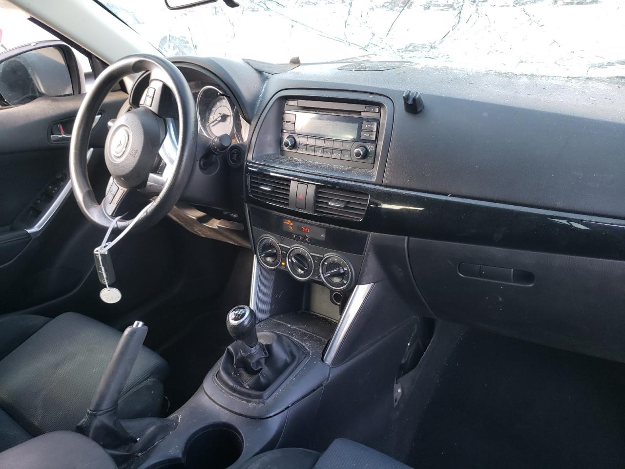Photo 9 from auction – 2014 MAZDA CX-5 SPORT with VIN JM3KE2BE7E0328593