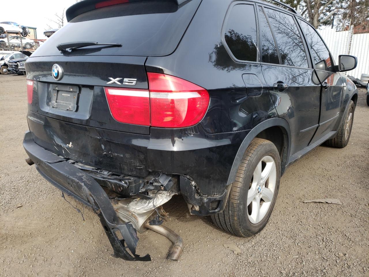 Photo 9 from auction – 2009 BMW X5 with VIN 5UXFE43579L272114