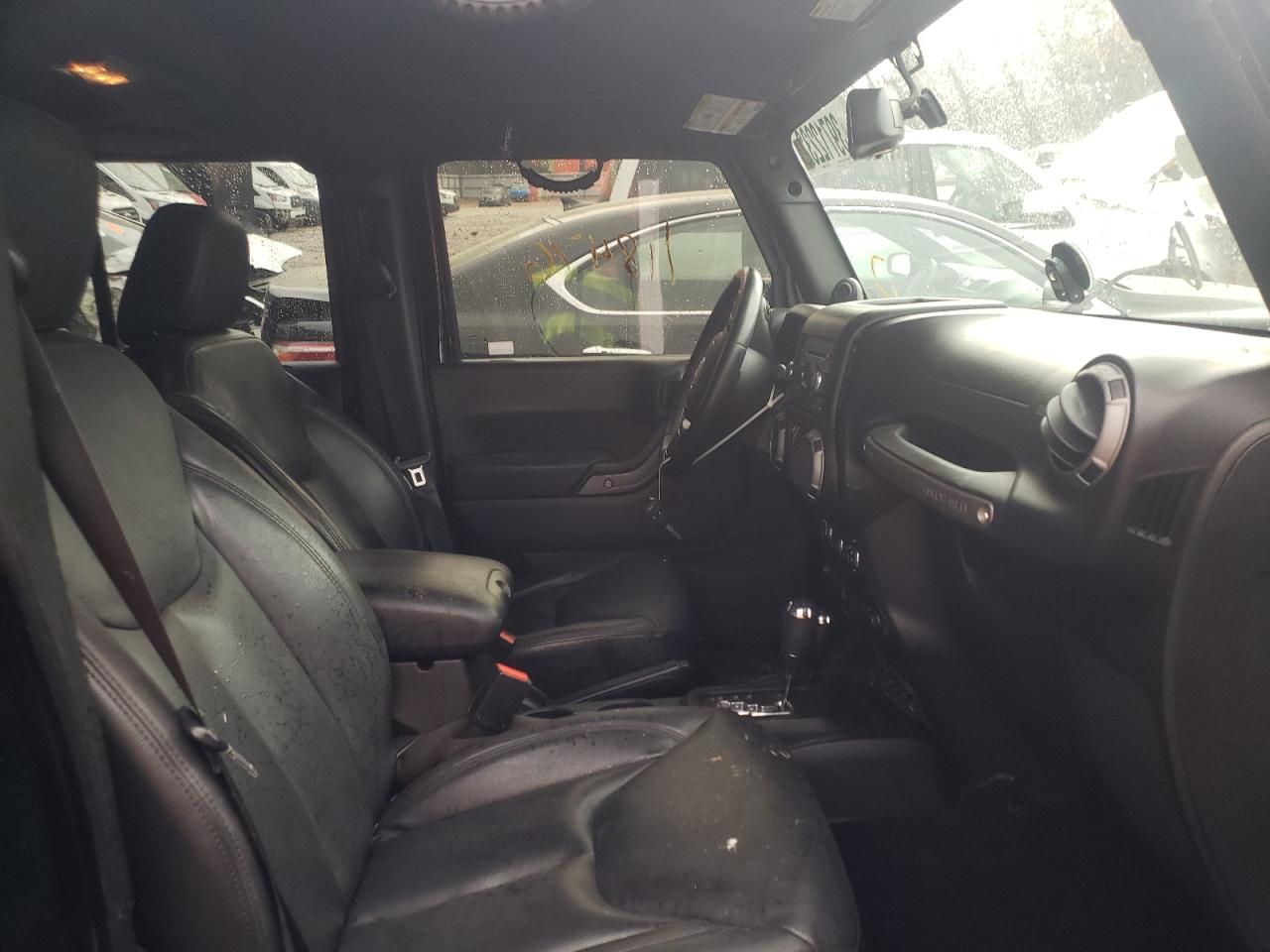 Photo 5 from auction – 2014 JEEP WRANGLER U with VIN 1C4BJWDGXEL133614