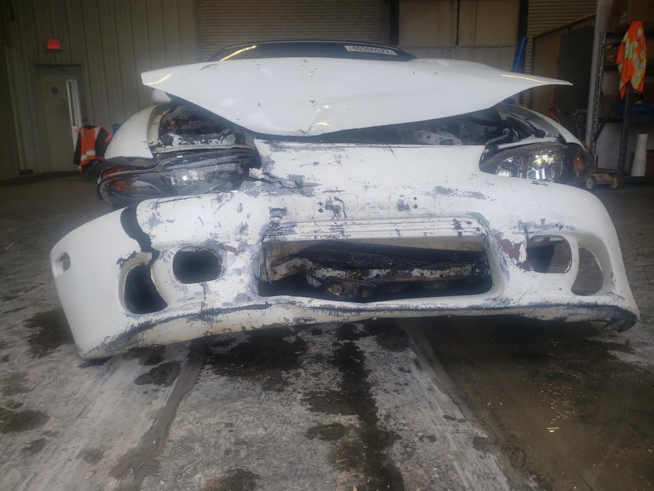 Photo 9 from auction – 1999 MITSUBISHI ECLIPSE with VIN 4A3AX35G0XE048180