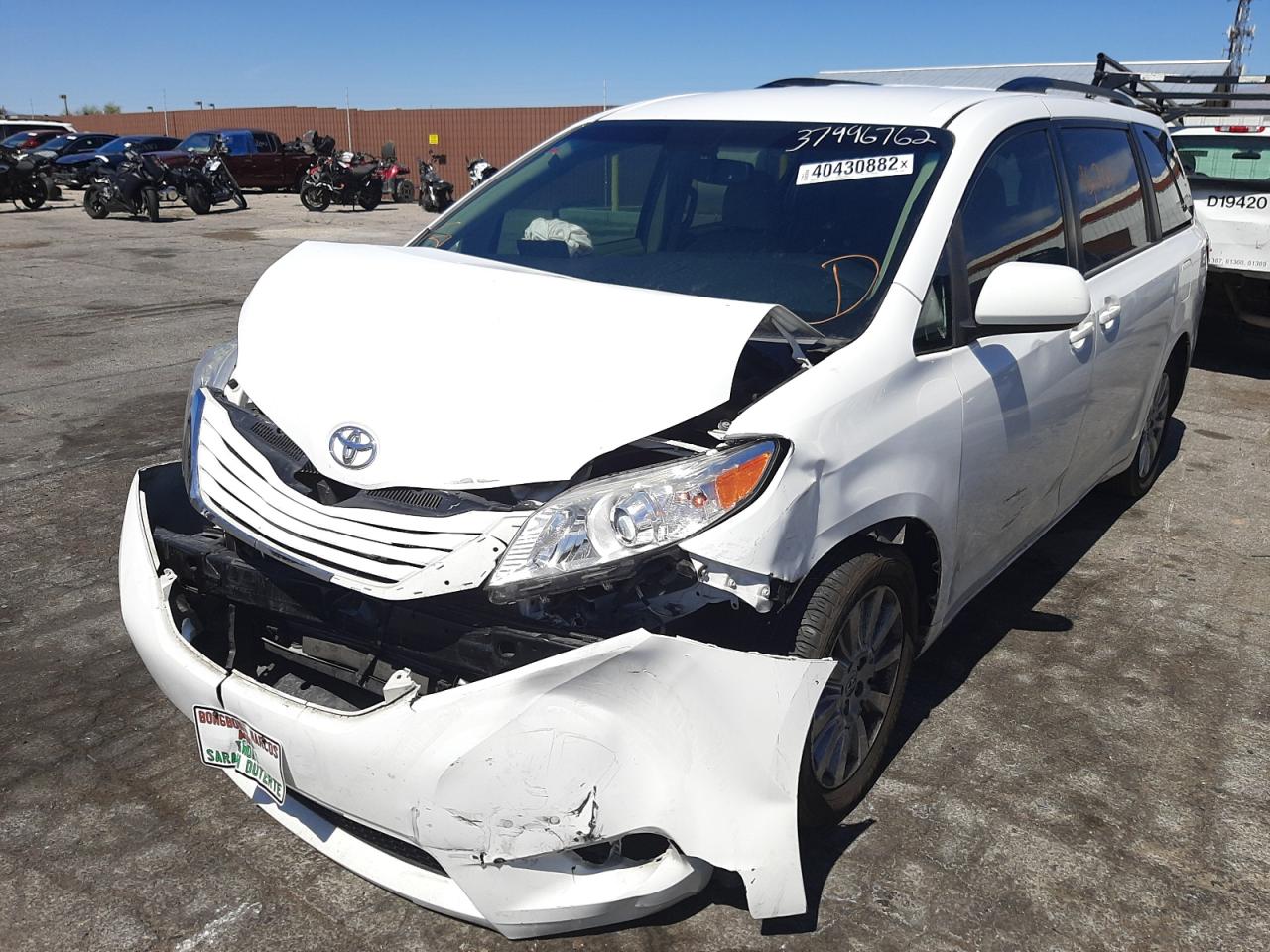 Photo 2 from auction – 2015 TOYOTA SIENNA LE with VIN 5TDJK3DC9FS108952