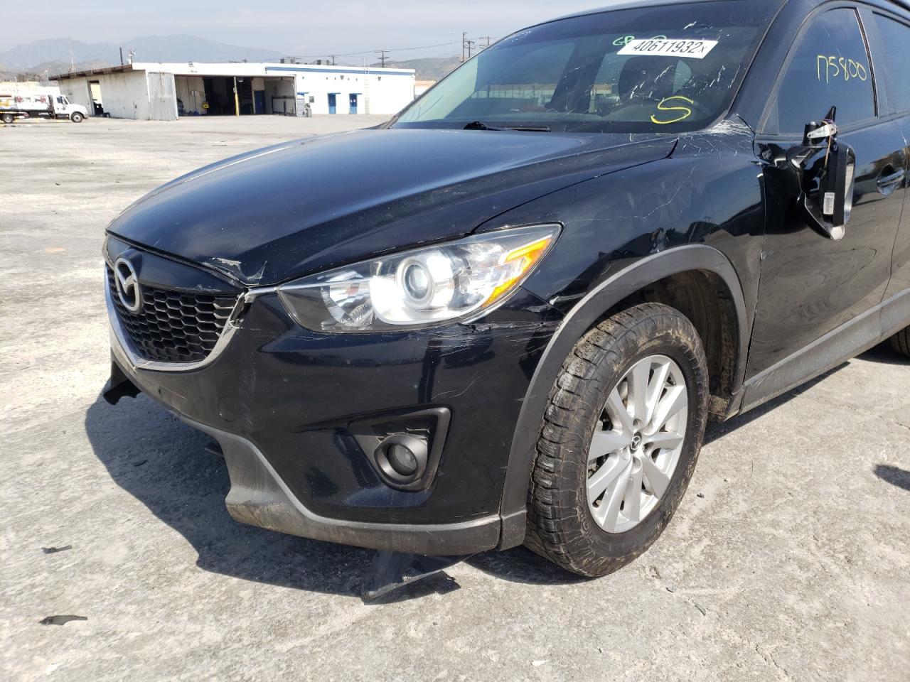 Photo 9 from auction – 2015 MAZDA CX-5 TOURI with VIN JM3KE2CY1F0436668
