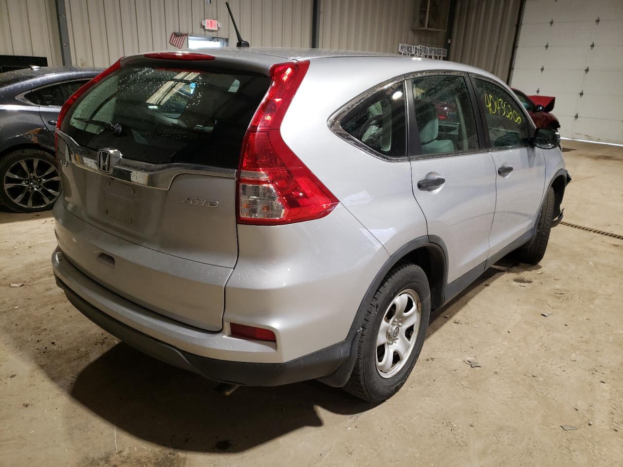 Photo 4 from auction – 2015 HONDA CR-V LX with VIN 5J6RM4H35FL119049