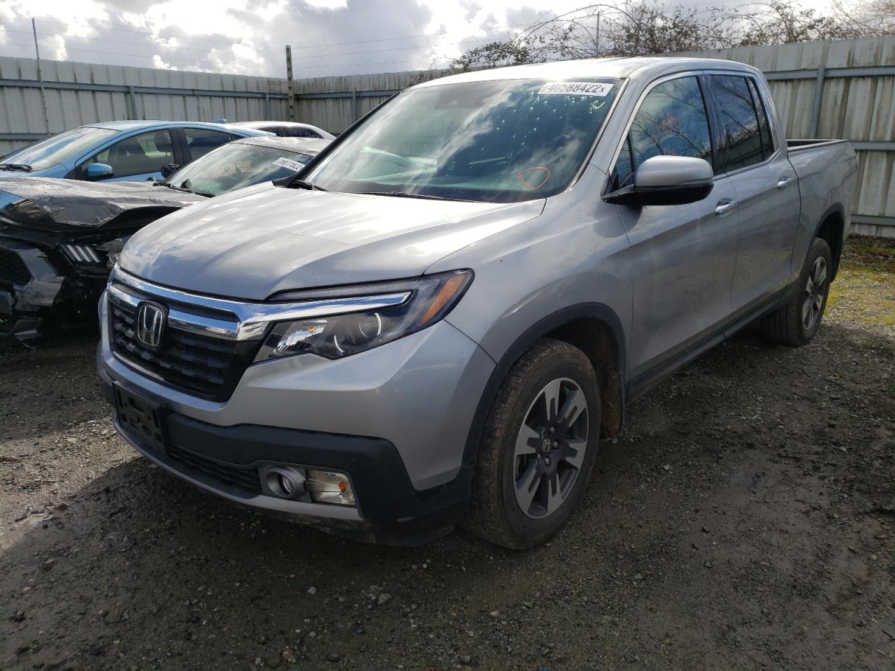 Photo 2 from auction – 2019 HONDA RIDGELINE with VIN 5FPYK3F78KB018230