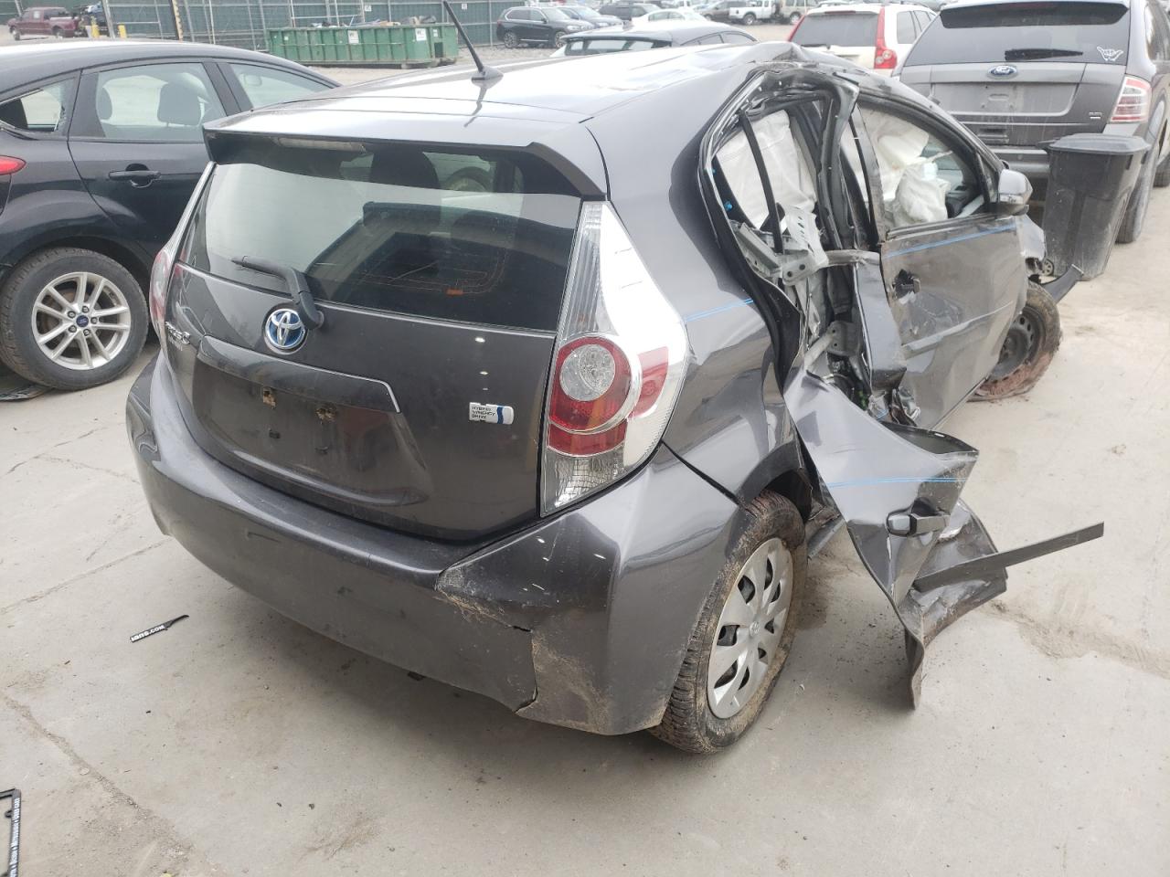 Photo 4 from auction – 2014 TOYOTA PRIUS C with VIN JTDKDTB37E1566048